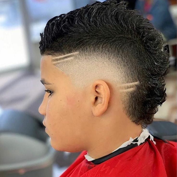 Mohawk rizado con burst fade